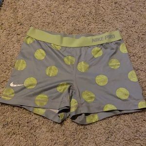 Grey and yellow Nike Pro, Dri-Fit Spandex. Size Medium